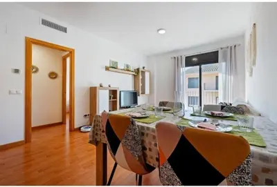 Una televisión o centro de entretenimiento en Apartamentos de Miguel