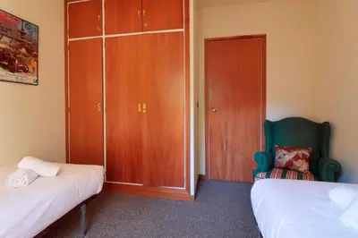 Cama o camas de una habitación en Apartarent 1500 - Apartamento Timonet