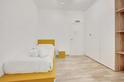 Cama o camas de una habitación en Primera Rivera Suite
