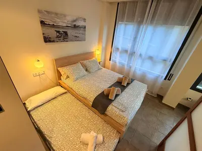 Cama o camas de una habitación en El Loft de Salàs - L'Amfitriona