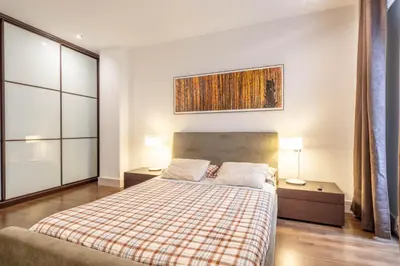 Cama o camas de una habitación en Luxurious apartment in the center of Zaragoza