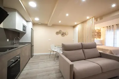 Una cocina o zona de cocina en Apartamentos Bombón Tudela