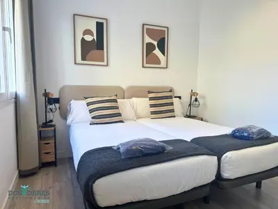 Cama o camas de una habitación en Dos Torres Las Canteras