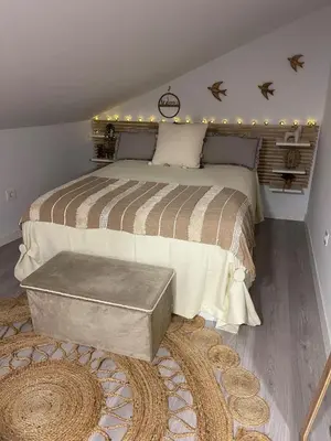 Cama o camas de una habitación en Dúplex Basílica del Pilar Temporada