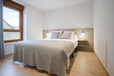 Cama o camas de una habitación en Aiguamog by FeelFree Rentals