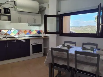 Una cocina o zona de cocina en Pasarelas Ático junto a la Colegiata