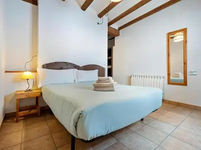 Cama o camas de una habitación en Magnificent village house in Rojals