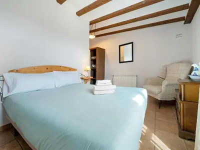 Cama o camas de una habitación en Magnificent village house in Rojals