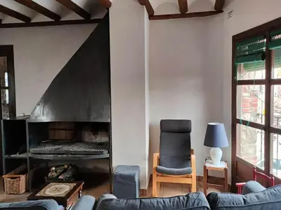 Zona de estar de Magnificent village house in Rojals