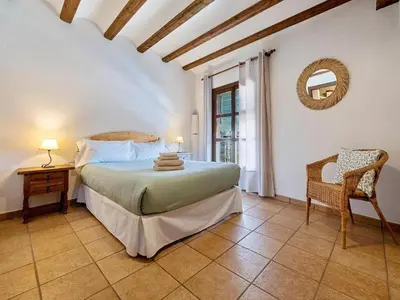 Cama o camas de una habitación en Magnificent village house in Rojals
