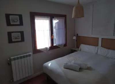 Cama o camas de una habitación en Apartamento en formigal