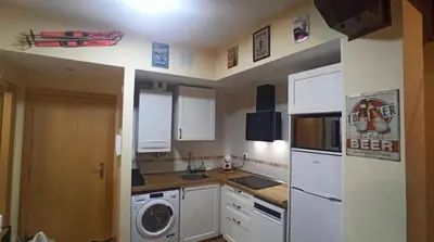 Una cocina o zona de cocina en Apartamento en formigal