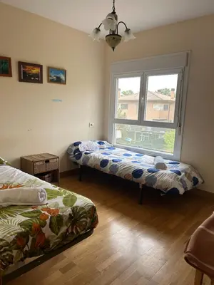 Cama o camas de una habitación en La Casita Azul Family Home