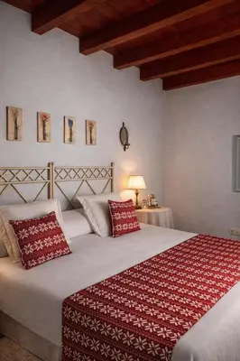 Cama o camas de una habitación en El Cau de l'Aina