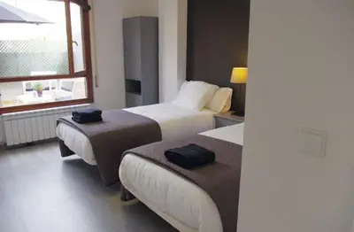Cama o camas de una habitación en Riojania El Vino