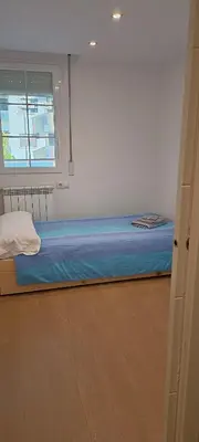 Cama o camas de una habitación en Apartamento en Huesca capital