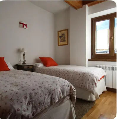 Cama o camas de una habitación en Bonito spartsmento a 5 minutos de Baqueira