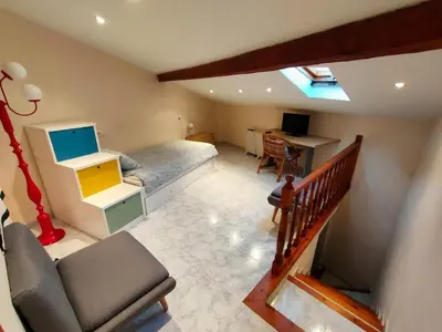Una televisión o centro de entretenimiento en Cal Pataqué, house in Arnes