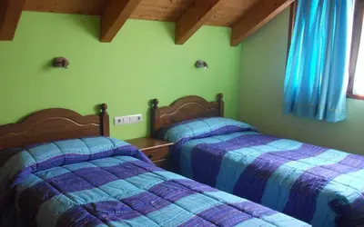 Cama o camas de una habitación en Casa La Bordeta Remondillo