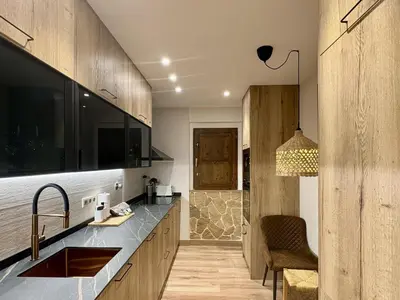 Una cocina o zona de cocina en Atico de lujo en el Pirineo