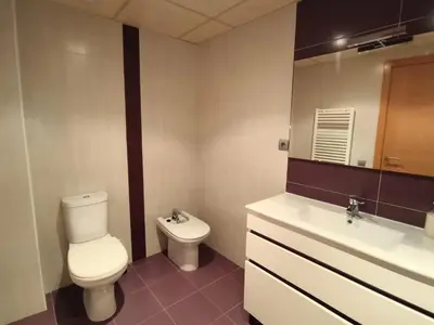 Un baño de Apartamentos La Aubaga