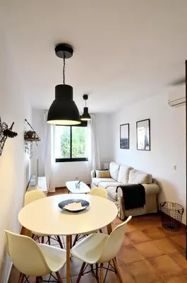Zona de estar de Apartaments la Rambla - L'Arrel - 4 persones