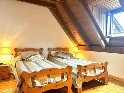 Cama o camas de una habitación en Casa rústica y patio en la Vall d'Aran by RURAL D'ÀNEU
