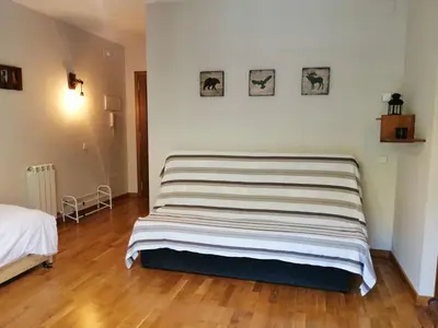 Cama o camas de una habitación en Apartment Geräumiges Studio mit Balkon Erta 2 Vall de Boí by Interhome