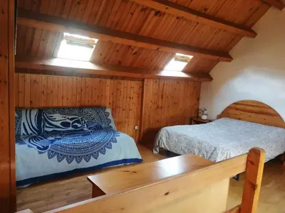 Cama o camas de una habitación en Apartment Geräumige Maisonette mit Kamin Isard 2 Vall de Boí by Interhome