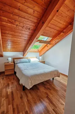 Cama o camas de una habitación en Apartment Aüt 3 Dachgeschosswohnung in Vall de Boí by Interhome