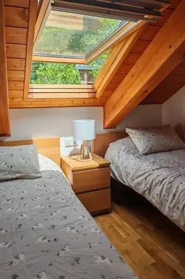 Cama o camas de una habitación en Apartment Aüt 3 Dachgeschosswohnung in Vall de Boí by Interhome