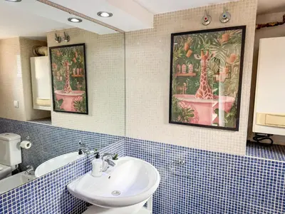Un baño de Historias del Pilar - Turistea