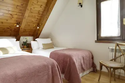 Cama o camas de una habitación en Era Garona by FeelFree Rentals