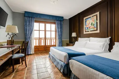 Cama o camas de una habitación en hotel os de civis