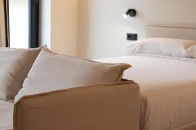 Cama o camas de una habitación en Salon Suites