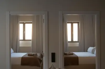 Cama o camas de una habitación en Salon Suites
