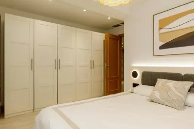 Cama o camas de una habitación en Apartamento con Parking Gratis al lado del Pilar - Alfonso Suites