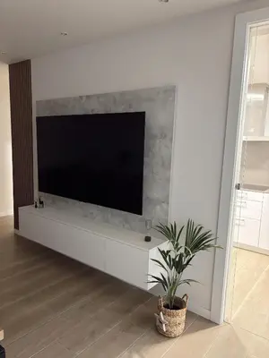 Una televisión o centro de entretenimiento en Apartamento entero