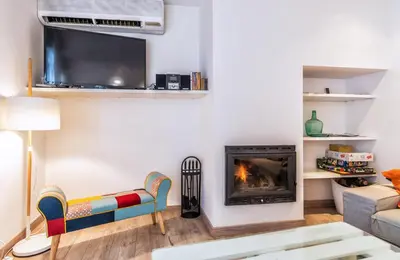 Una televisión o centro de entretenimiento en Ca La Josefa