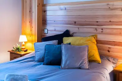 Cama o camas de una habitación en Marmota Home Panticosa l WIFI l Pie de pistas SKI
