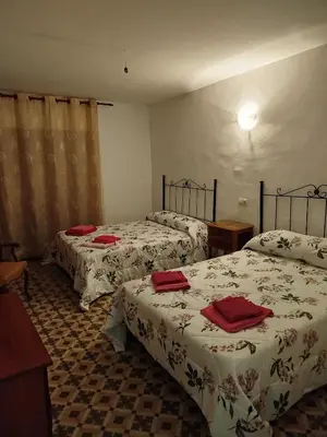 Cama o camas de una habitación en El Molino de Foz Calanda