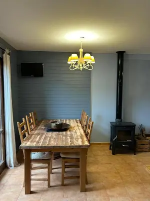 Una televisión o centro de entretenimiento en Chalet Hoz de Jaca