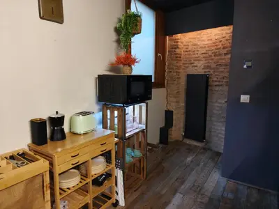 Una televisión o centro de entretenimiento en El Loft de Torrenueva by Alogest