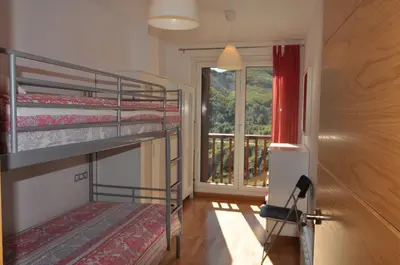 Cama o camas de una habitación en Apartamentos Tirol