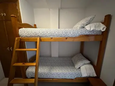 Litera o literas de una habitación en Apartamentos Tirol