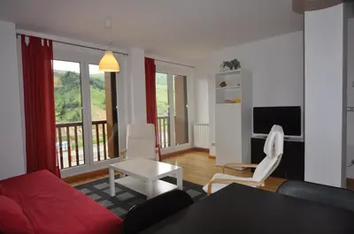Zona de estar de Apartamentos Tirol