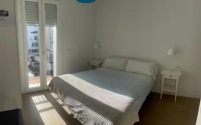 Cama o camas de una habitación en Apartaments Plaza Príncipe Viana