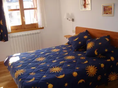 Cama o camas de una habitación en Apartamento Lamatriz Dequin Edificio Sayo 8