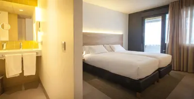Cama o camas de una habitación en Hotel A Pamplona