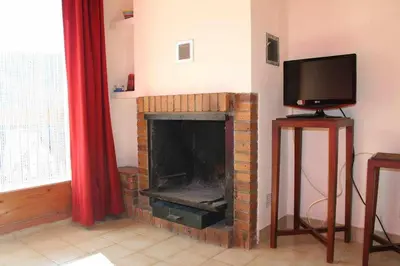 Una televisión o centro de entretenimiento en Apartamento Vall Fosca